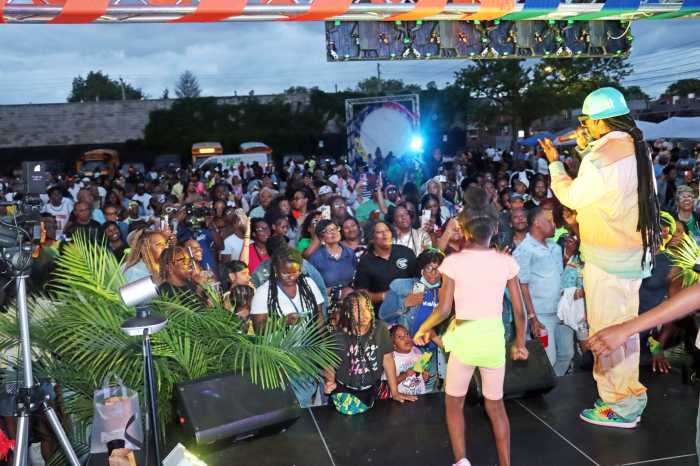 Party crowd takes in Problem Child's mesmerizing performances during the launch of Vincy Mas.